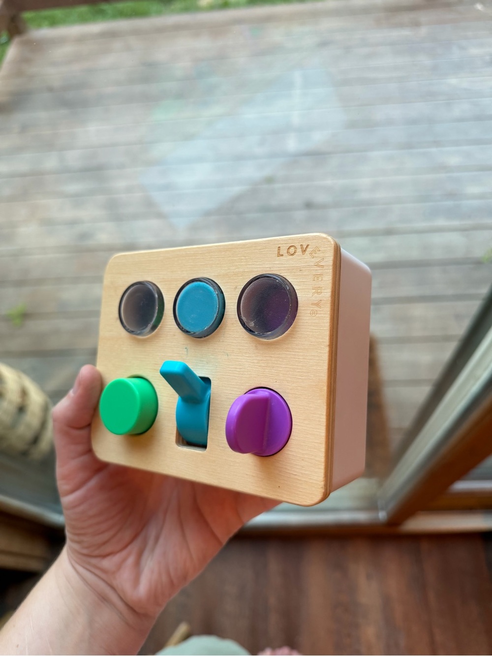 Wooden Learning Activity Box with Purple, Teal, and Green Controls